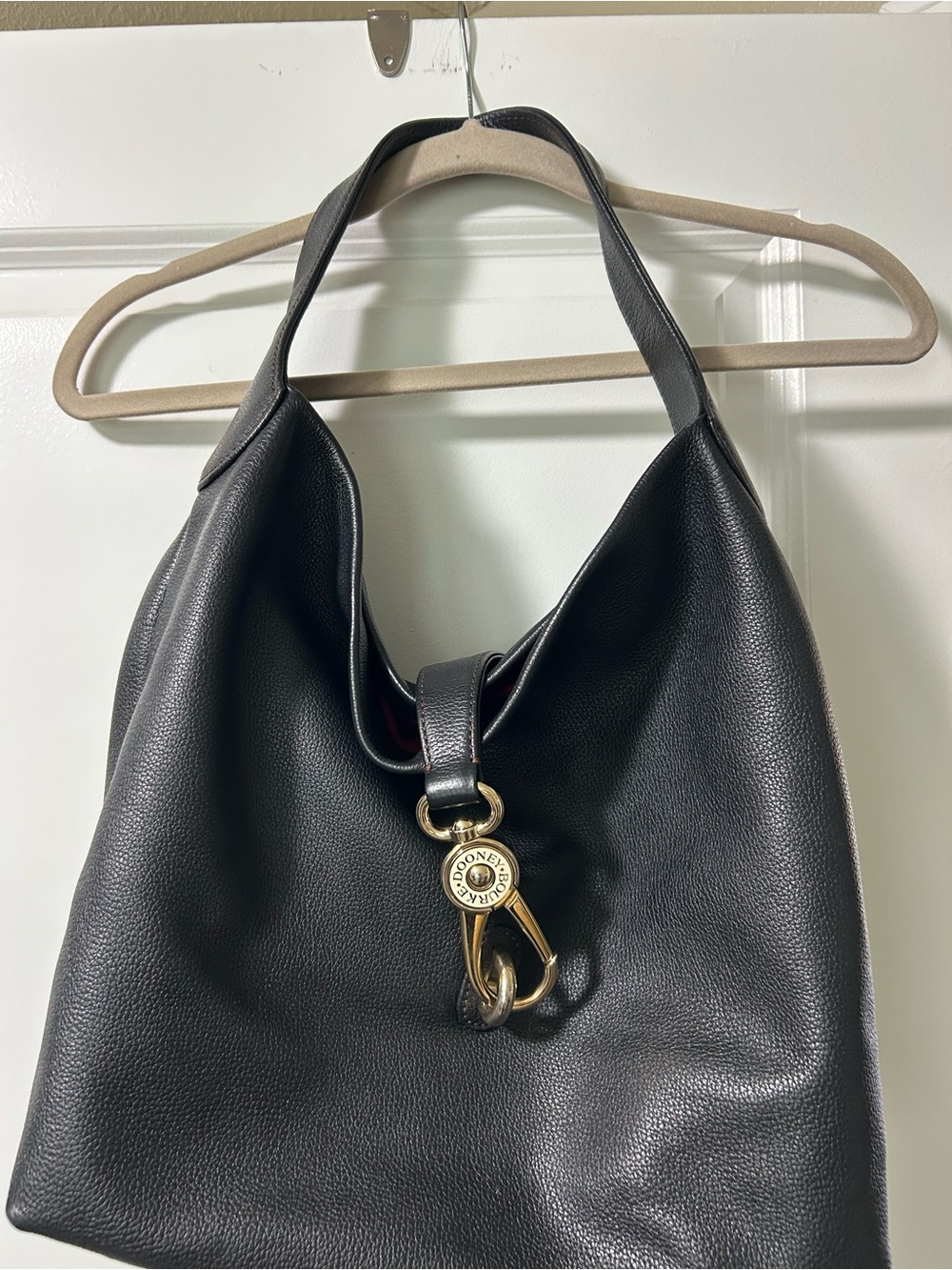 Dooney & Bourke Black Leather Hobo with Gold-Tone Signature Clasp